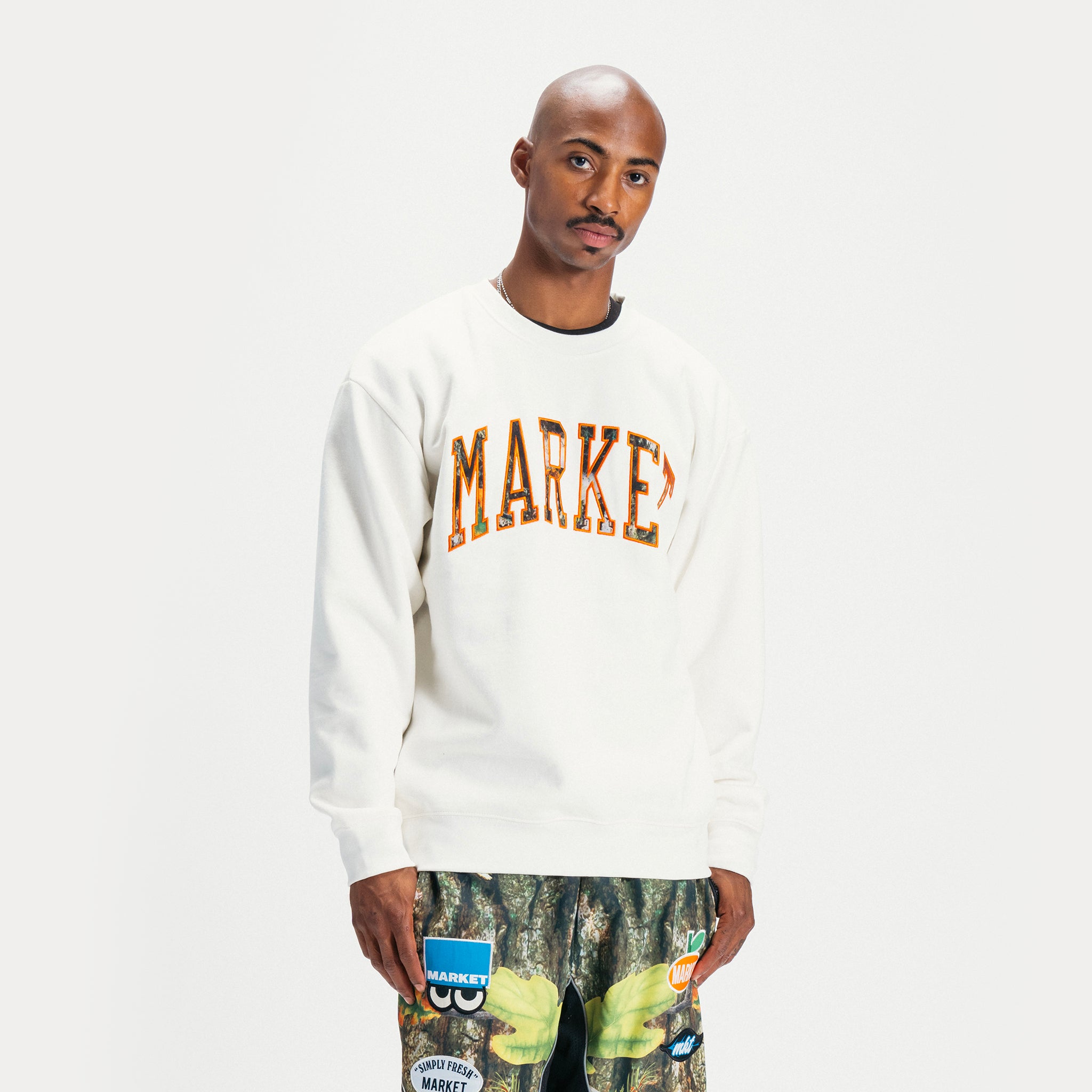 MARKET clothing brand FAUXTREE ARC CREWNECK SWEATSHIRT. Find more graphic tees and hoodies at MarketStudios.com. Formally Chinatown Market.