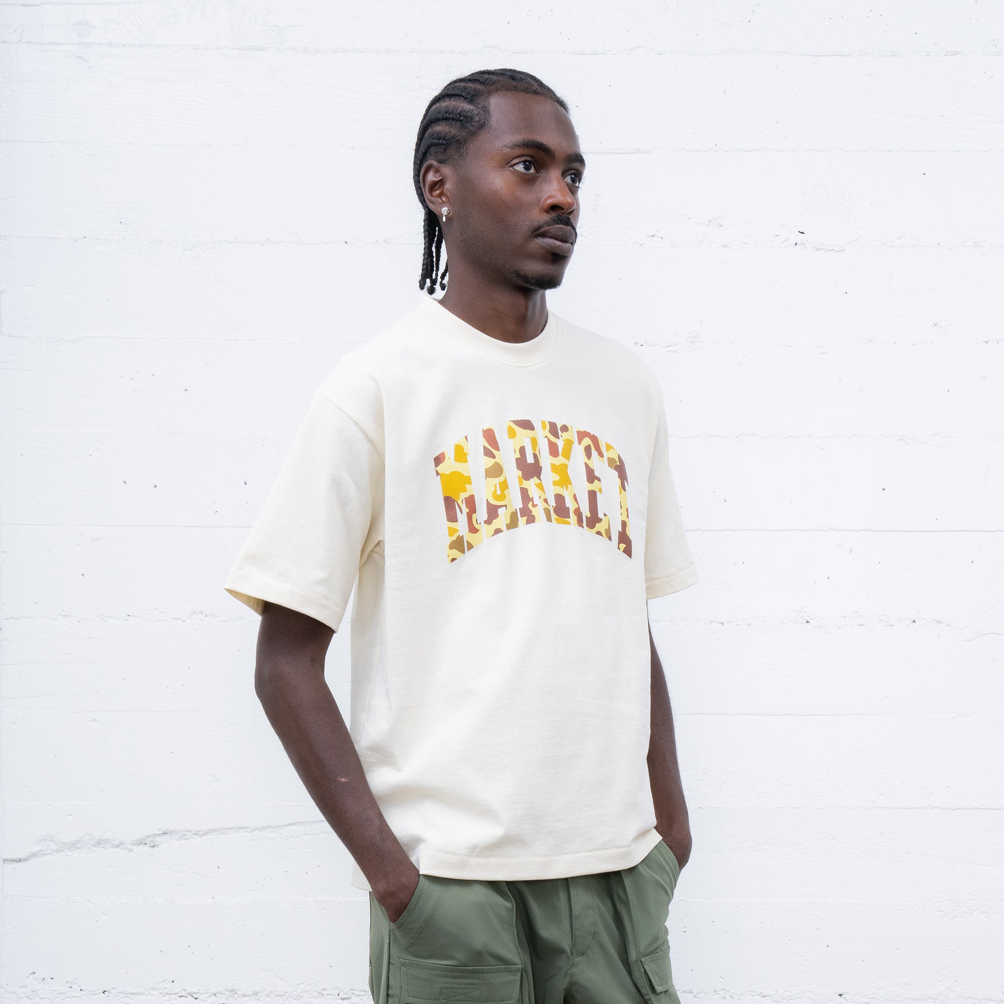 MARKET clothing brand DUCK CAMO ARC T-SHIRT. Find more graphic tees, hats, hoodies and more at MarketStudios.com. Formally Chinatown Market.