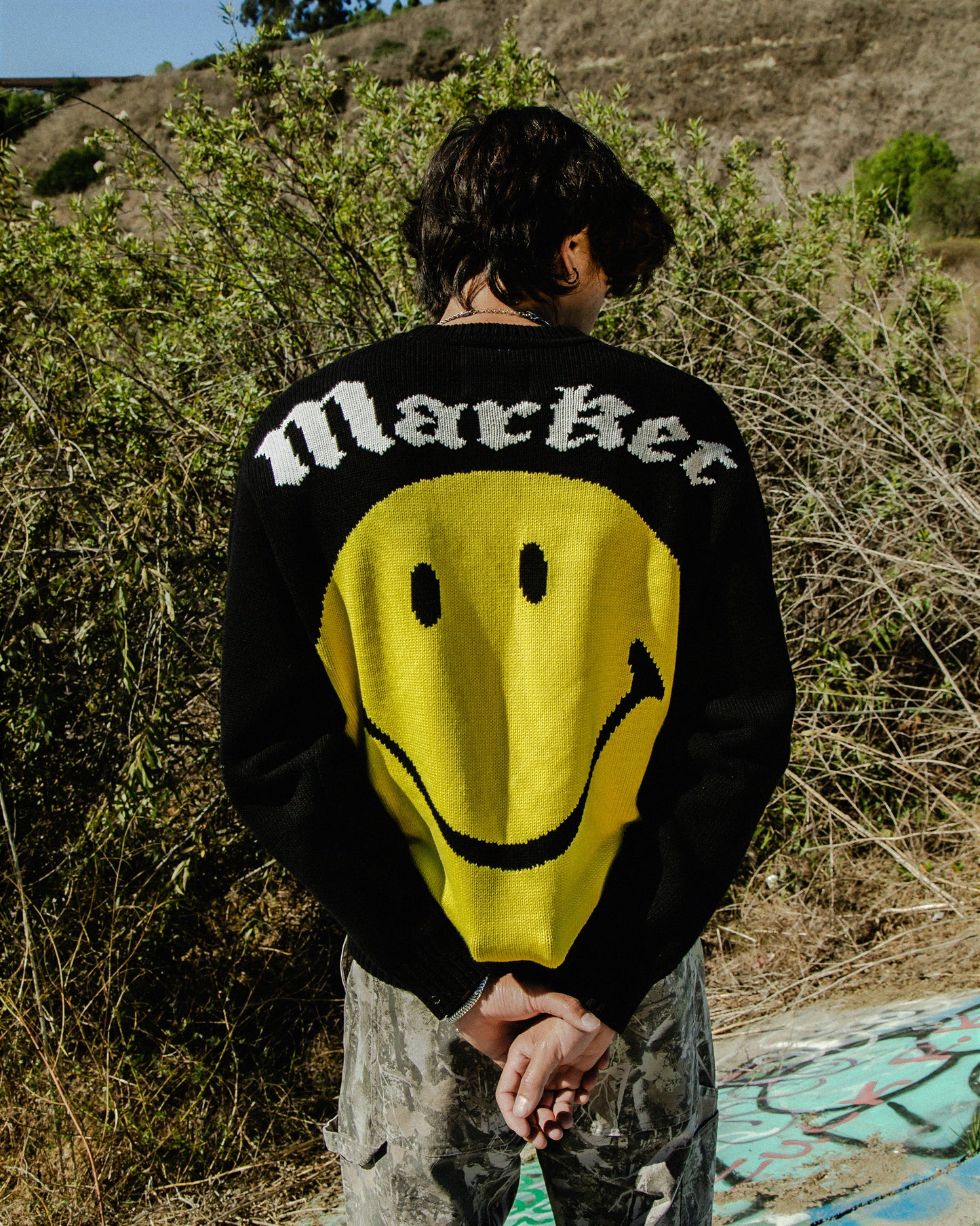 MARKET clothing brand SMILEY GOTHIC SWEATER. Find more graphic tees, jackets, cardigans and more at MarketStudios.com. Formally Chinatown Market.