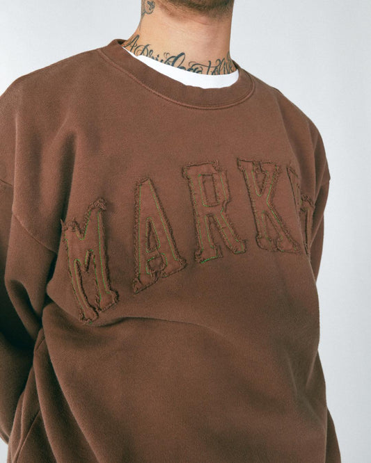 MARKET clothing brand MARKET VINTAGE WASH CREWNECK. Find more graphic tees and hoodies at MarketStudios.com. Formally Chinatown Market.