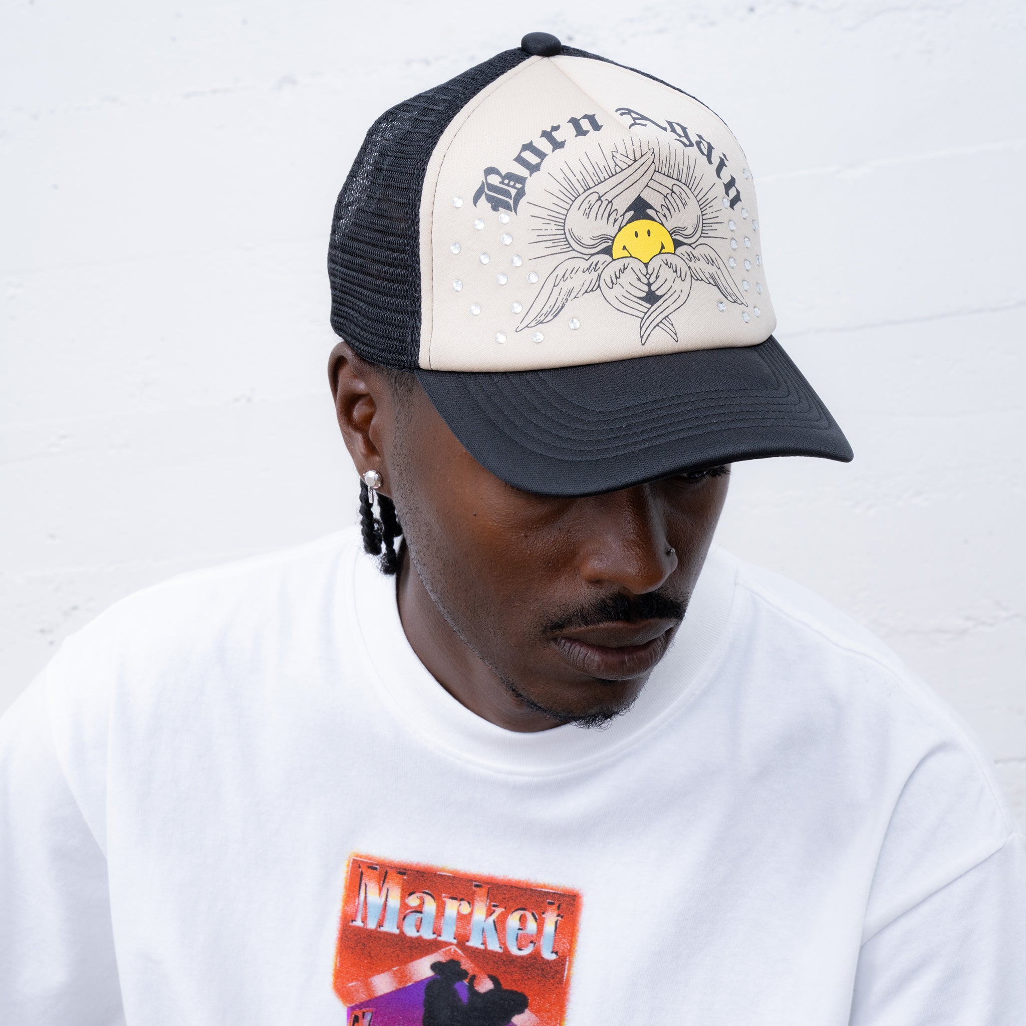 MARKET clothing brand SMILEY BORN AGAIN TRUCKER HAT. Find more graphic tees, hats, beanies, hoodies at MarketStudios.com. Formally Chinatown Market. 