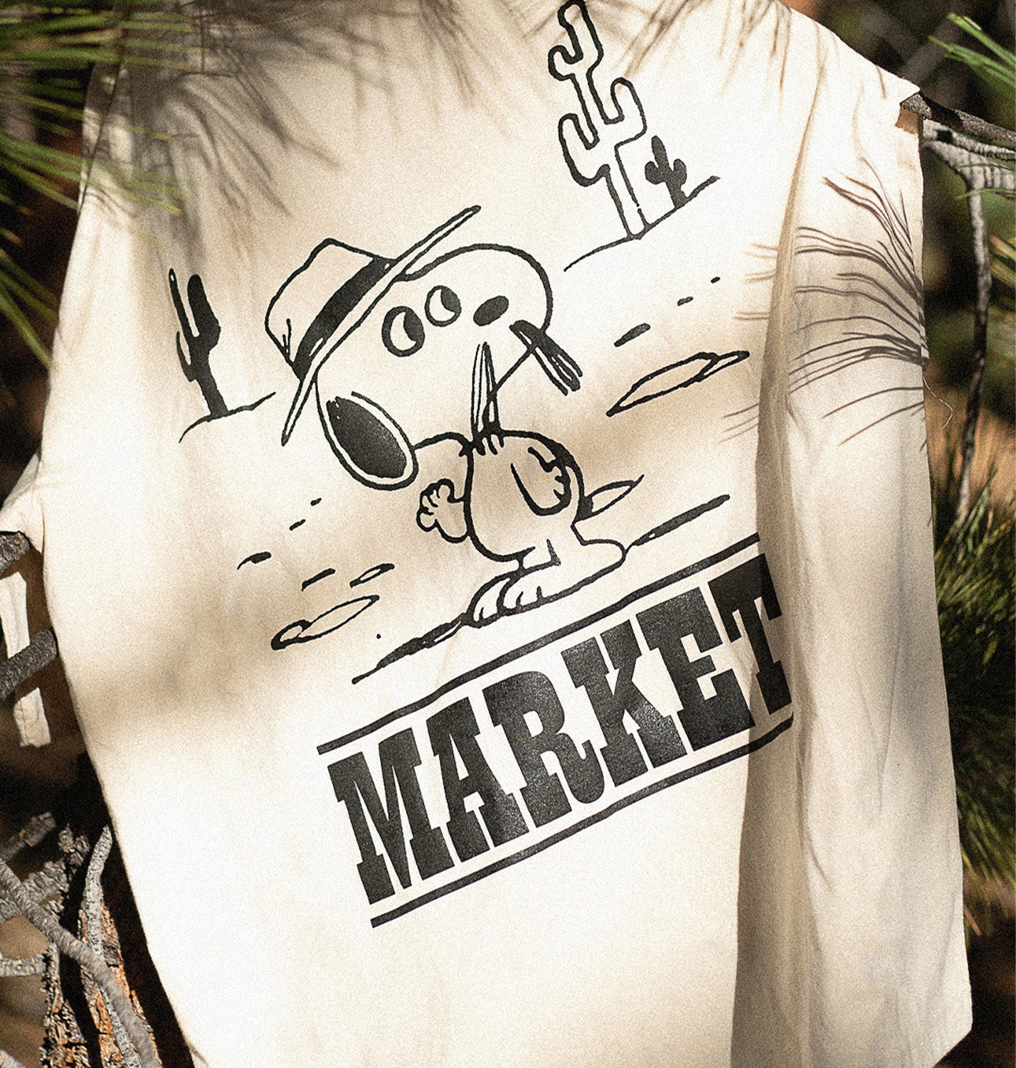 MARKET clothing brand PEANUTS NEEDLES T-SHIRT. Find more graphic tees and hoodies at MarketStudios.com. Formally Chinatown Market.
